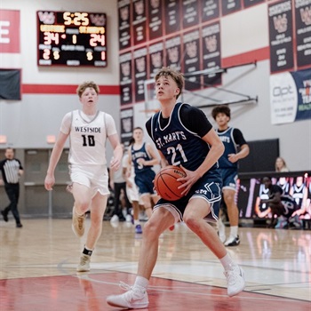 Tai Zimmerman attacking the basket